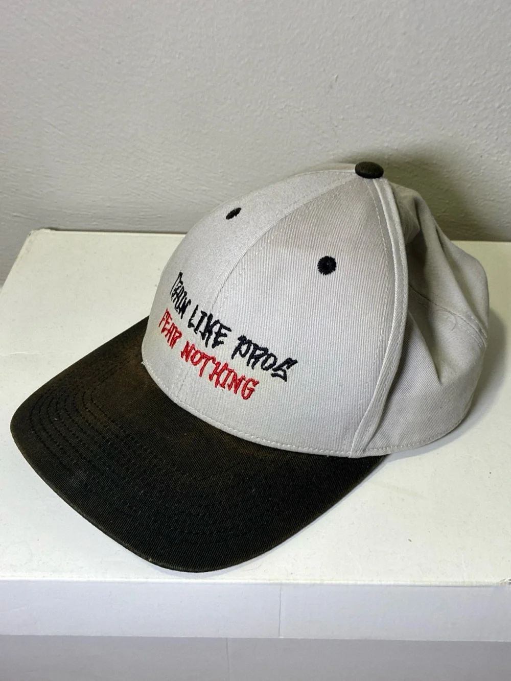 Two-Tone Black and‎ Cream Baseball Cap with Embroidered Slogan